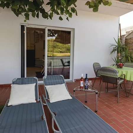 Three-bedroom In Hébergement de vacances